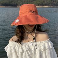 Women's Vacation Simple Style Solid Color Chrysanthemum Wide Eaves Bucket Hat main image 5