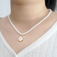 Vintage Style Simple Style Flower Imitation Pearl Copper Inlay Shell Zircon Gold Plated Women's Pendant Necklace main image 7