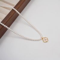 Vintage Style Simple Style Flower Imitation Pearl Copper Inlay Shell Zircon Gold Plated Women's Pendant Necklace main image 5