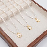 Basic Simple Style Classic Style Geometric Imitation Pearl Copper Inlay Shell Gold Plated Women's Pendant Necklace main image 5