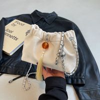 Women's Medium Pu Leather Solid Color Classic Style Streetwear Tassel Magnetic Buckle Crossbody Bag main image 7