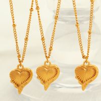 304 Stainless Steel Titanium Steel 18K Gold Plated Casual Retro Hollow Out Inlay Heart Shape Tulip Zircon Pendant Necklace main image 6