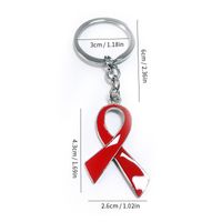 Modern Style Classic Style Red Ribbon Zinc Alloy White Gold Plated Bag Pendant Keychain main image 2