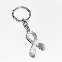 Modern Style Classic Style Red Ribbon Zinc Alloy White Gold Plated Bag Pendant Keychain main image 3