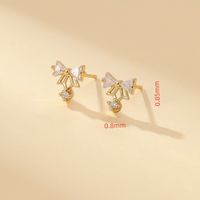 1 Pair Elegant Sweet Simple Style Bowtie Hollow Out Inlay Copper Zircon Ear Studs main image 2