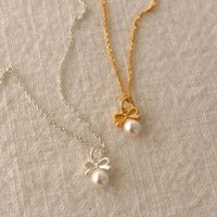 Sterling Silver Casual Inlay Bow Knot Pearl Pendant Necklace main image 1