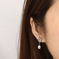 1 Pair Simple Style Oval Inlay 304 Stainless Steel Pearl 18K Gold Plated Drop Earrings main image 10