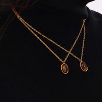 304 Stainless Steel 18K Gold Plated Retro British Style Plating Inlay Oval Pea Natural Stone Tiger Eye Pendant Necklace main image 4