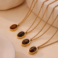 304 Stainless Steel 18K Gold Plated Retro British Style Plating Inlay Oval Pea Natural Stone Tiger Eye Pendant Necklace main image 3