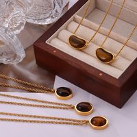 304 Stainless Steel 18K Gold Plated Retro British Style Plating Inlay Oval Pea Natural Stone Tiger Eye Pendant Necklace main image 8