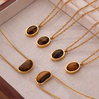 304 Stainless Steel 18K Gold Plated Retro British Style Plating Inlay Oval Pea Natural Stone Tiger Eye Pendant Necklace main image 1