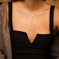 304 Stainless Steel 18K Gold Plated IG Style Elegant MAMA Hollow Out Inlay Letter Zircon Pendant Necklace main image 1