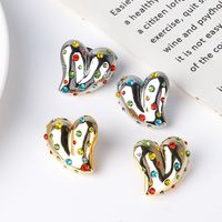 1 Pair Simple Style Heart Shape Inlay Copper Artificial Rhinestones Artificial Diamond Gold Plated Ear Studs main image 1