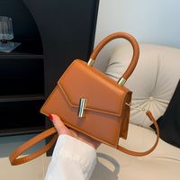 Women's Medium Pu Leather Solid Color Streetwear Lock Clasp Handbag Crossbody Bag main image 1
