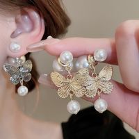 1 Pair Vintage Style Simple Style Butterfly Inlay Alloy Imitation Pearl Drop Earrings main image 1