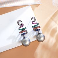 1 Pair Elegant Simple Style Shiny Round Spiral Stripe Plating Inlay Copper Pearl Zircon White Gold Plated Drop Earrings main image 3