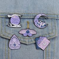 Cartoon Style Artistic Moon Eye Butterfly Alloy Stamping Stoving Varnish Plating Women's Brooches main image 1