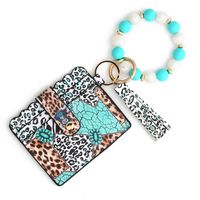 Casual Ethnic Style Sunflower Solid Color Leopard Pu Leather Beaded Tassel Keychain main image 3