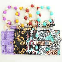 Casual Ethnic Style Sunflower Solid Color Leopard Pu Leather Beaded Tassel Keychain main image 5