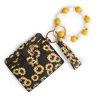 Lässig Ethnischer Stil Sonnenblume Einfarbig Leopard Pu-Leder Perlen Quaste Schlüsselbund sku image 12