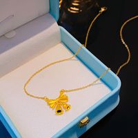 Großhandel Elegant Glänzend Lotus Bogenknoten Edelstahl 304 Kupfer Überzug 18 Karat Vergoldet Halskette Mit Anhänger main image 7