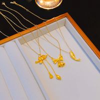 Großhandel Elegant Glänzend Lotus Bogenknoten Edelstahl 304 Kupfer Überzug 18 Karat Vergoldet Halskette Mit Anhänger main image 1