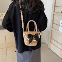 Women's Straw Solid Color Bow Knot Beach Weave Sewing Thread String Handbag Crossbody Bag Bucket Bag main image 6