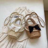 Women's Straw Solid Color Bow Knot Beach Weave Sewing Thread String Handbag Crossbody Bag Bucket Bag main image video