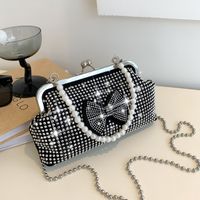 Women's Small Light Diamond Pu Leather Solid Color Bow Knot Vintage Style Clasp Frame Crossbody Bag main image 1