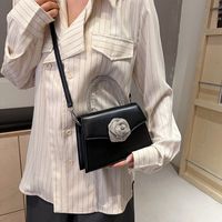 Women's Small Pu Leather Solid Color Flower Streetwear Magnetic Buckle Crossbody Bag main image 2
