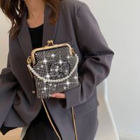 Women's Small Light Diamond Pu Leather Solid Color Bow Knot Vintage Style Clasp Frame Crossbody Bag main image 3