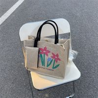 Women's Medium Fabric Letter Flower Streetwear Magnetic Buckle Tote Bag main image 1