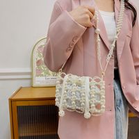 Women's Small Pearl Solid Color Elegant Classic Style Beading Hollow String Crossbody Bag main image 4