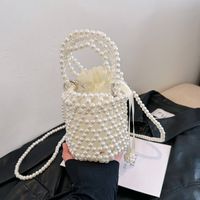 Mujeres Pequeña Perla Color Sólido Elegante Estilo Clásico Cuentas Cuerda Bolso Bandolera main image 1