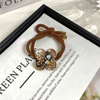 Women's Sweet Simple Style Number Flower Alloy Inlay Artificial Crystal Rhinestones Pearl Hair Tie main image 5