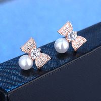 1 Pair Elegant Modern Style Commute Bow Knot Inlay Copper Artificial Pearls Zircon Drop Earrings main image 3