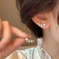 1 Pair Simple Style Classic Style Round Inlay Alloy Pearl Ear Studs main image 1