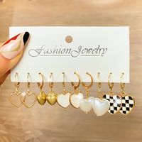 Retro Heart Shape Butterfly Twist Alloy Inlay Artificial Pearls Rhinestones Women's Earrings 1 Set sku image 5