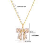Copper Casual Elegant Simple Style Inlay Bow Knot Artificial Pearls Zircon Pendant Necklace main image 3