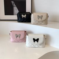Women's Medium Pu Leather Solid Color Butterfly Classic Style Streetwear Flip Cover Crossbody Bag main image video