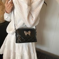 Women's Medium Pu Leather Solid Color Butterfly Classic Style Streetwear Flip Cover Crossbody Bag sku image 1