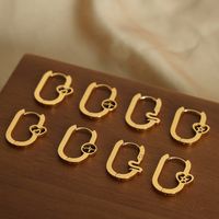 1 Pair Casual Elegant Simple Style Four Leaf Clover Electrocardiogram Heart Shape Plating Hollow Out Titanium Steel 18K Gold Plated Earrings main image 3