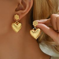 1 Pair Ethnic Style Shiny Star Heart Shape Flower Hollow Out Copper Zinc Alloy 18K Gold Plated Drop Earrings main image 5