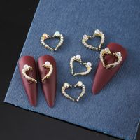 Süss Einfacher Stil Herzform Flügel Zinklegierung Nagel Accessoires Eine Packung Mit 30 main image 1
