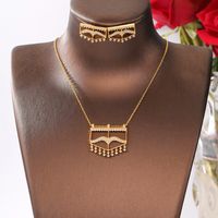 Cobre Chapados en oro de 18k Elegante Señora Nupcial Embutido Geométrico Circón Aretes Collar main image 1