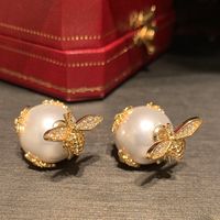 1 Pair Simple Style Shiny Bee Hollow Out Inlay Sequin Brass Artificial Pearls Zircon Gold Plated Ear Studs main image 6