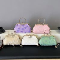 Women's Medium Pu Leather Gauze Flower Classic Style Clasp Frame Crossbody Bag main image 11