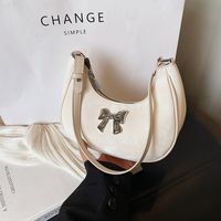 Femmes Moyen Faux Cuir Couleur Unie Noeud D'Arc Style Classique Vêtement De Rue Fermeture Éclair Sac Sous Les Bras main image video