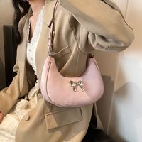 Femmes Moyen Faux Cuir Couleur Unie Noeud D'Arc Style Classique Vêtement De Rue Fermeture Éclair Sac Sous Les Bras main image 6