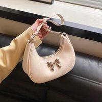 Femmes Moyen Faux Cuir Couleur Unie Noeud D'Arc Style Classique Vêtement De Rue Fermeture Éclair Sac Sous Les Bras main image 9